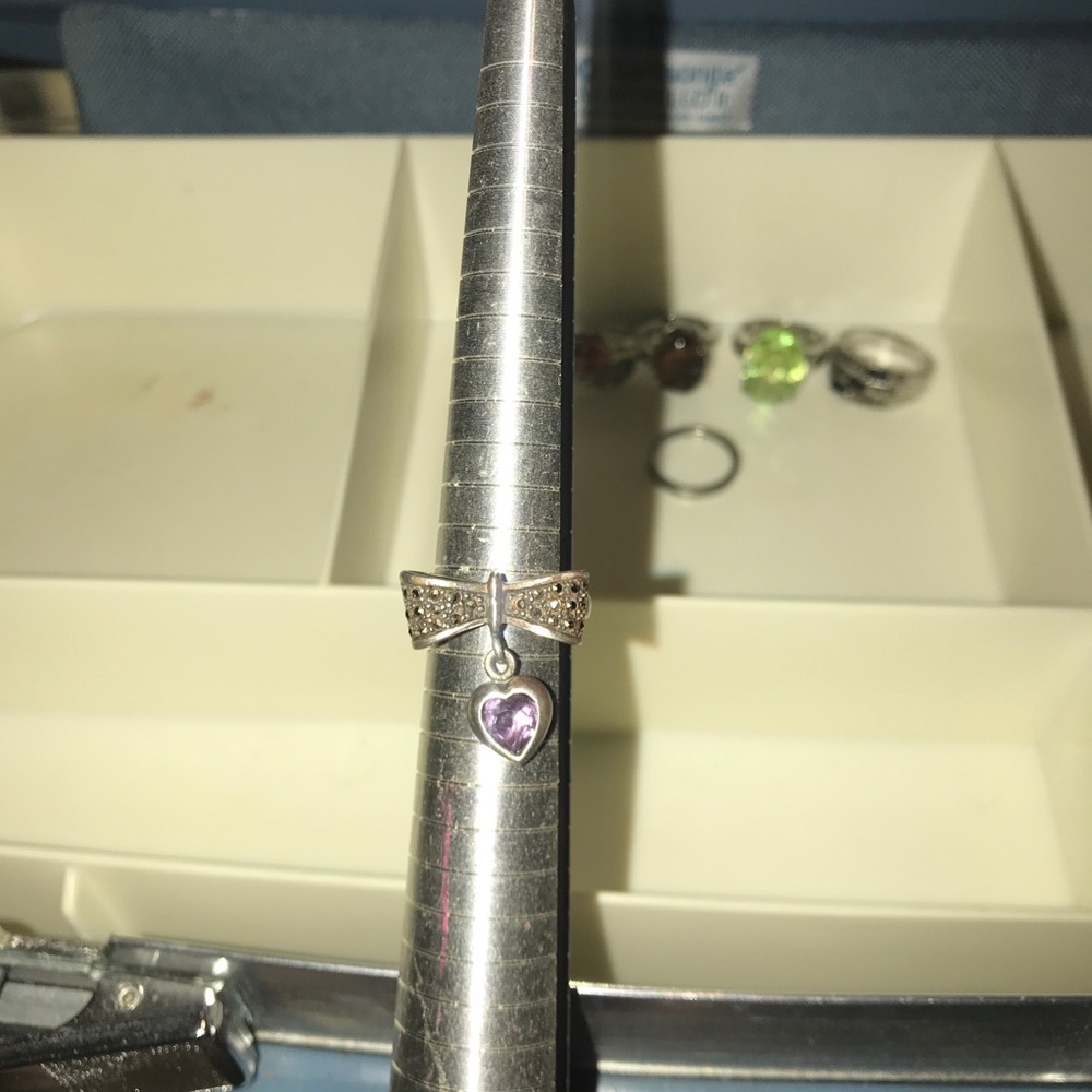 .925 Sterling Silver size 7 Bow Ring with nat. Amethyst dangling Heart Charm